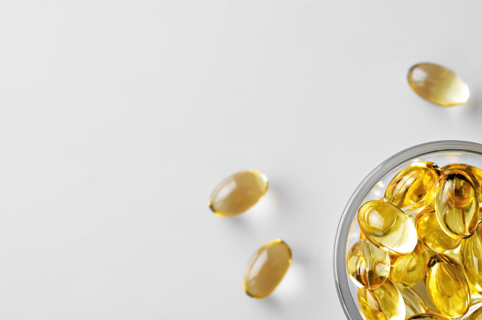 A bowl of yellow pills
AI-generated content may be incorrect.